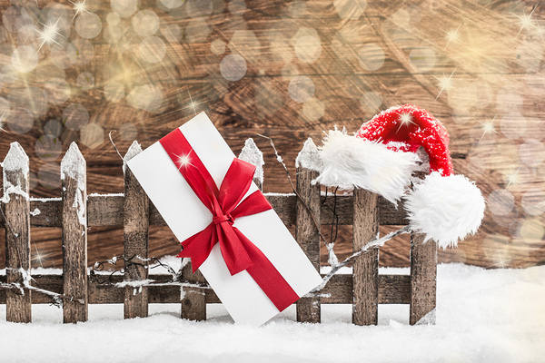 This jpeg image - Christmas Background with Santa Hat and Gift, is available for free download