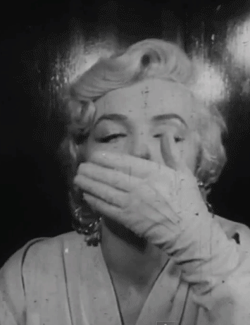 This gif image - Marilyn Monroe Kiss Gif Animation, is available for free download