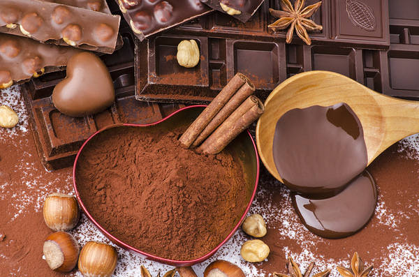 This jpeg image - Chocolate and Hazelnuts Background, is available for free download