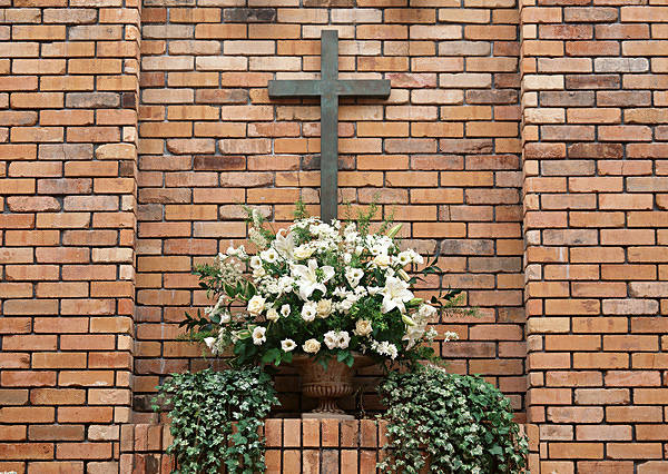 This jpeg image - Cross and Flowers Brick Wall Background, is available for free download