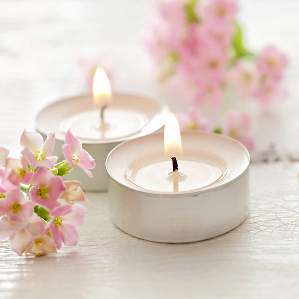 This jpeg image - Tea Candles and Flowers Background, is available for free download