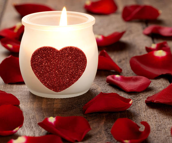 This jpeg image - Valentine's Day Background with Candle and Rose Petals, is available for free download