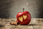 Apple with Hearts Background