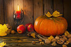 Beautiful Autumn Background with Pumpkin and Candle