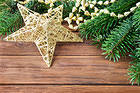 Christmas Golden Star and Pine Branches Background