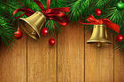 Christmas Wooden Background with Gold Bells-and Red Ribbon