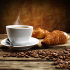 Cup of Coffee Coffee Seeds and Croissants Background