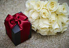 Gift and White Roses Background