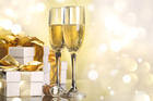 Golden Background with Gift and Champagne