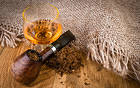 Pipe Tobacco and Whiskey Background