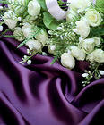Purple Satin with White Flowers Background