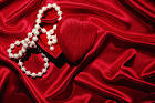 Red Satin Heart and Pearls Background