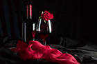 Red and Black Satin Background with Wine and Rose