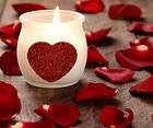 Valentine's Day Background with Candle and Rose Petals