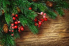 Wooden Christmas Background with Pine Branches